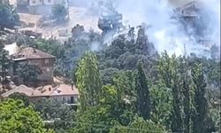 Uşak'ın Sivaslı ilçesine bağlı Ketenlik köyünde evlerin olduğu yerde orman yangını tekrar başladı
