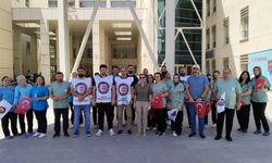 HAK-İŞ üyeleri, Uşak Eğitim ve Araştırma Hastanesi'nde 12 şehit için anma programı düzenledi