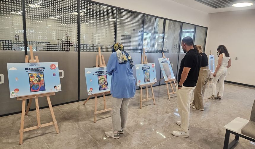 Uşak OEDAŞta sergilenen resim ve şiirlerle tasarruf bilincine dair farkındalık oluşturuluyor